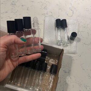 Set of Clear Glass Roller Bottles with Black Caps